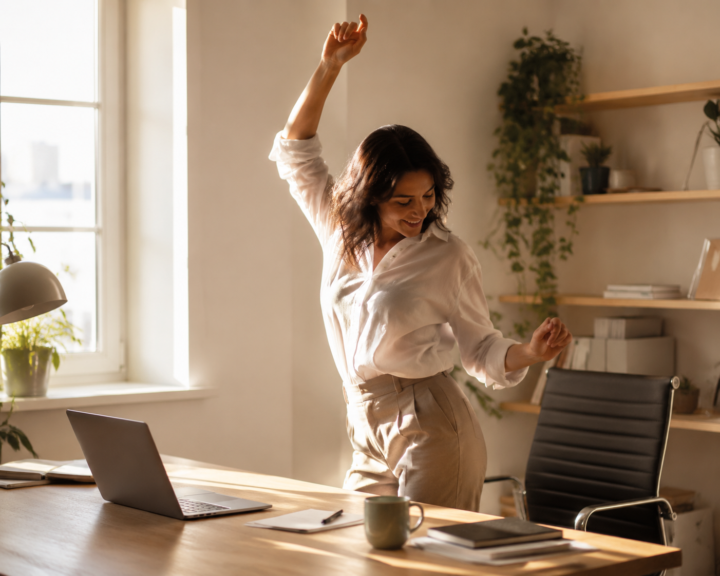 Remote worker standing from a desk for a spontaneous mid-afternoon dance break