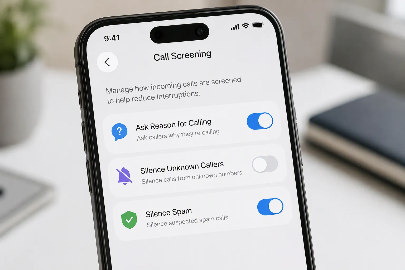 Close-up of an iPhone settings screen with call screening toggles for Ask Reason for Calling, Silence Unknown Callers, and Silence Spam