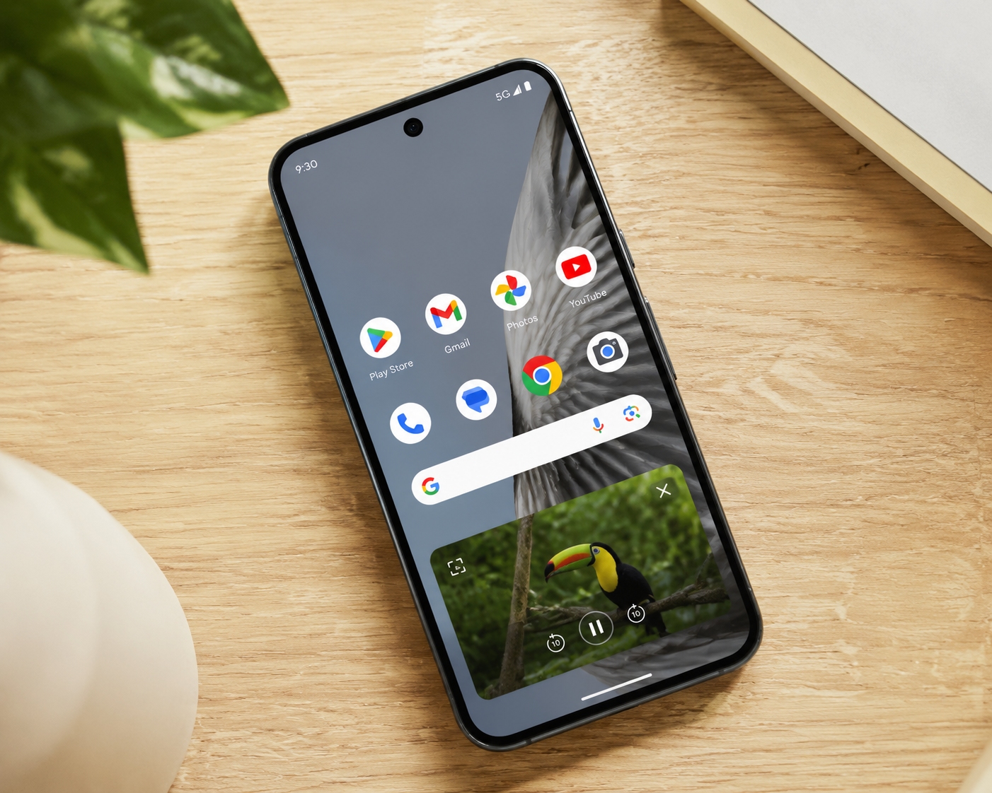 Android phone showing YouTube playing in a picture-in-picture floating window
